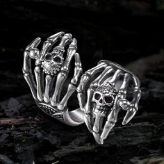 This is a Gothic skull ring that your other fingers will not be able to... Gothic Skull Open Ring Gift, Silver Stainless Steel Skull Ring In Punk Style, Gothic Metal Skull Ring Gift, Gothic Skull Ring Metal Gift, Punk Stainless Steel Rings For Halloween, Halloween Stainless Steel Ring Jewelry, Gothic Metal Skull Ring For Promise, Gothic Metal Skull Ring As Promise Ring, Gothic Skull Ring In Stainless Steel For Halloween