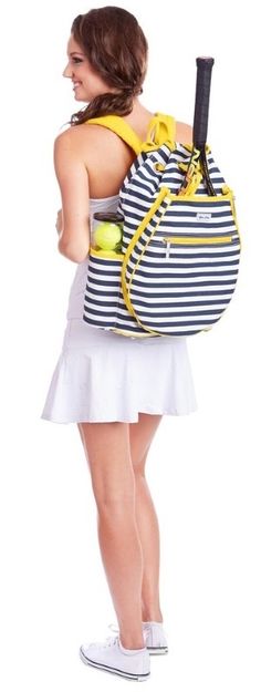 a woman with a tennis racket in her back pack