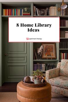 a living room filled with furniture and bookshelves covered in green bookcases