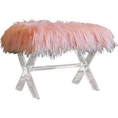 a pink bench with metal legs and fur on it's top, against a white background