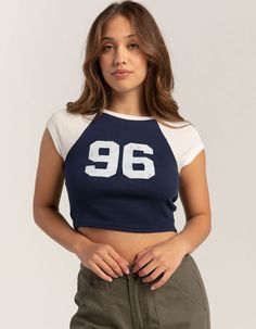 Rsq 96 Raglan Baby Tee. Screen Print On Front. Crewneck Baby Tee. Contrasting Neckline And Short Sleeves. Form Fitting. 50% Cotton, 50% Polyester. Machine Wash. Imported. Model Is Wearing A Size Small Model Measurements:height: 5'7" Bust: 32"waist: 25"hips: 36"