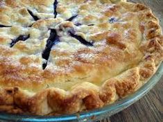 a pie sitting on top of a wooden table