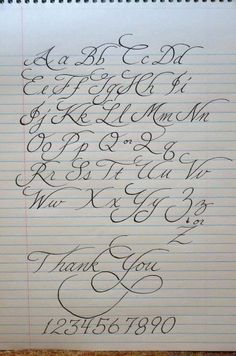 a notepad with writing on it and the words thank you written in cursive ink