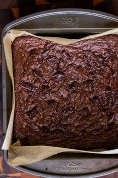 a loaf of chocolate cake sitting on top of a pan