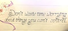 a white brick wall with writing on it that says don't waste time worrying about things you can't control