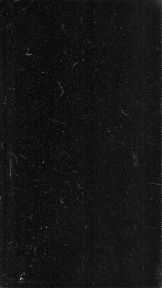 an old black and white photo with small dots on it's edges, in the dark