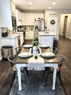 a dining room table with place settings on it and the words instagram above it