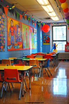 an empty classroom with many tables and chairs in front of the wall decorated with balloons