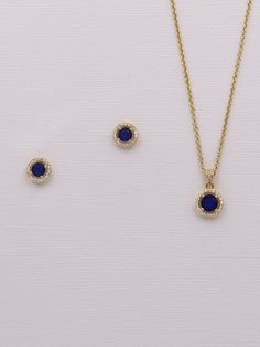 "This dainty jewelry set will surely add sparkle on your special day! Boasting brilliant cubic zirconia in a framed round, classic design with a navy blue sapphire colored cz center stone set in brilliant gold plating. Stud earrings measure 8mm. Necklace measures 16\" and has an extender to extend up to 18\" long. This beautiful jewelry comes in a gift box ready for gift giving! Choose from multiple jewelry options. Matching (optional) bracelet measures 7\" and finishes out the look. This set is Sapphire Gold Necklace, Gold Necklace And Earrings Set, Navy Blue Jewelry, Rose Gold Jewelry Set, Sapphire Jewelry Set, Blue Jewelry Set, Blue Sapphire Necklace, Rose Quartz Jewelry, Bridesmaid Gifts Jewelry