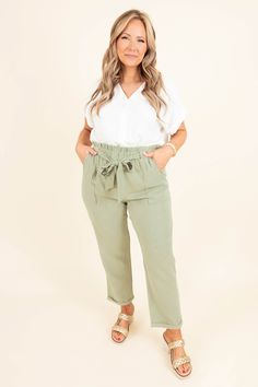 Feel so nice when you wear these amazing pants! These babes are so chic with the tie at the waist and the sage color! These are neutral enough to pair with anything and the elastic waistband is comfy enough for all day wear! Pair this cutie with a fun top and some heels for a chic look! 49% Rayon, 34% Polyester, 17% Nylon Trendy Tie Waist Pants, Green Tie Waist Bottoms For Spring, Chic Green Bottoms With Tie Waist, Spring Green Pants With Tie Waist, Trendy Olive Pants For Spring, Chic Green Tie-waist Bottoms, Chic Paperbag Waist Bottoms With Tie, Chic Olive High Waist Bottoms, Chic Relaxed Fit Bottoms With Tie Waist