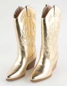 Soda Orville Western Boots. Faux Leather Boots With Western Stitch Detailing. Pointed Toe. Synthetic Outsole. Stacked Heel. Pull Tabs For Easy On And Off. Mid-Calf Boots. Approx. Heel Height: 3". Imported. Gold Cowgirl Boots, Gold Cowboy Boots, Womens Western Boots, Chino Pants Women, Gold Boots, Swift Tour, Tour Outfits, Lug Sole Boots, Faux Leather Boots