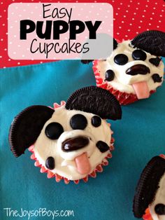 three cupcakes with black and white frosting decorated like puppies on them