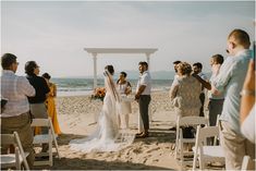 a couple getting married on the beach