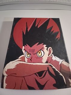 a painting of an anime character with red hair and yellow eyes is hanging on the wall