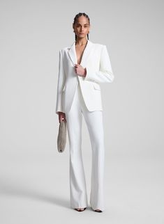 The Sophie II Pant is crafted from our signature suiting fabric in a timeless shade of off white. This flared-leg silhouette features a mid-rise waist and slash pockets. Shop Bottoms Styling Tip: Pair with the Elza Blazer and pointed-toe pumps for an iconic, tailored look. Off White 4, Suiting Fabric, Tailored Pants, Tailored Jacket, Size 00, Modern Woman, Dress Pants, Mid Rise, Ready To Wear