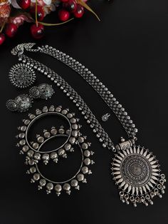 This minimalistic long oxidized necklace set is perfect for an Indian bride. Beautifully designed with German oxidized silver, this wedding set has a big intricate long Haram oxidized necklace, a pair of jhumki earrings, a ring, a pair of bangles, and a nose pin. This bridal oxidized set is available in six different patterns and sizes. Each of these pieces will work wonderfully on its own and even more elegant when worn together. You can also style them with your Navratri outfit or any ethnic o Antique Silver Oxidized Wedding Jewelry, Festive Oxidized Finish Bridal Necklace, Festive Oxidized Bridal Necklace, Chandbali Oxidized Wedding Jewelry Sets, Wedding Chandbali Jewelry Sets With Oxidized Finish, Wedding Chandbali Oxidized Jewelry Sets, Temple Jewelry Bridal Necklace With Oxidized Finish, Temple Jewelry Sets With Oxidized Finish For Wedding, Classic Silver Jewelry