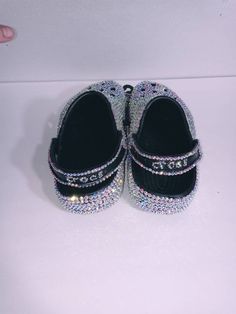 Custom crocs with any color rhinestones. Size range from 5 to 12 women also kids 4-9 toddler sizes. Kids 10-13 and big kids 1-4 are available i can order any size as long as crocs makes it and also any color that they have in stock message me size and color you would like. Crocs Bedazzled, Blinged Out Crocs, Wedding Crocs, Bedazzled Crocs, Cheer Black, Bedazzled Converse, Bedazzled Shoes Diy, Bling Crocs, Crocs Platform