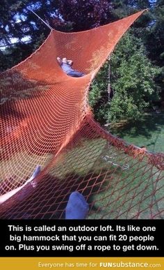 an orange hammock hanging from the side of a tree with people sitting in it