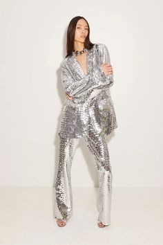 Sequin Robo Pant in Satellite Silver – Simon Miller Metallic Sequined Disco Pants, Metallic Sequin Disco Pants, Disco Sequined Fall Pants, Disco Sequin Pants For Fall, Disco Style Sequin Pants For Fall, Glamorous Metallic Sequin Pants, Glamorous Metallic Flare Bottoms, Metallic Flare Pants For Party, Evening Flare Bottoms With Sequins