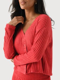 DESCRIPTION:This boxy, cropped cardigan is made from silky ribbed fabric for a luxurious feel.FEATURES:V-NecklineDropped ShoulderButton ClosureCropped SilhouetteRibbed Fabrication97% Polyester, 3% SpandexRelaxed FitModel is wearing size Small top.Haute Red: Model's Measurements: Height: 5'8" | Bust: 34C | Waist: 24" | Hips: 36.5" | Dress Size: 2-4 (US)Snowflake Blue: Model's Measurements: Height: 5'9.5" | Bust: 32C | Waist: 26.5" | Hips: 37" | Dress Size: 2-4 (US) Hair Socks, Lounge Shorts, Loungewear Shorts, Cardigan Top, Sleeve Cardigan, Cropped Cardigan, Scarf Hairstyles, Ribbed Fabric, Long Sleeve Cardigan