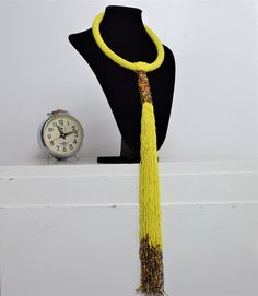 Elegant Yellow Long Beaded Necklaces, Elegant Yellow Long Beaded Necklace, Elegant Long Yellow Beaded Necklace, Yellow Round Beads Choker For Festivals, Yellow Festival Choker With Round Beads, Yellow Choker With Round Beads For Festivals, Adjustable Yellow Lariat Necklace, Yellow Long Bohemian Beaded Necklace, Adjustable Yellow Multi-strand Beaded Necklace