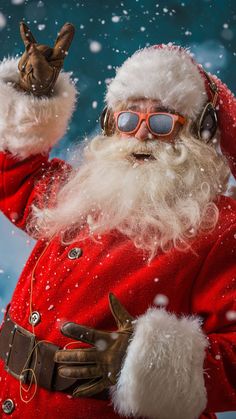 a man dressed as santa clause holding up his hand