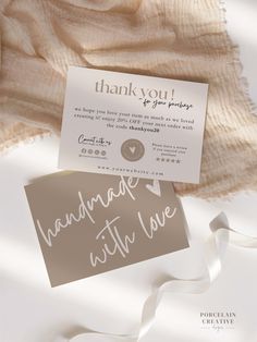 a thank card with the words handmade with love written on it next to a blanket