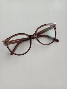 Chloe CE2694-210-5217 Eyeglasses Pre-owned - very good used condition, small traces of use. Sold without original case Model- CE2694 Color Code -210 Frame Color -Brown Frame Material - Plastic Lens Width- 52 mm Bridge Size- 17 mm Temple Length -140 mm Frame Of Glasses, Chloe Glasses Frames, Brown Frame Glasses, Brown Glasses Frames, Aesthetic Glasses Frames, Woman Glasses, Glasses Styles, Glasses Frames Trendy, Womens Eyeglasses