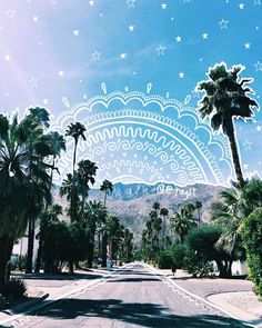 palm trees line the street in front of a mountain range and blue sky with stars