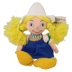 a yellow and blue stuffed doll with blonde hair