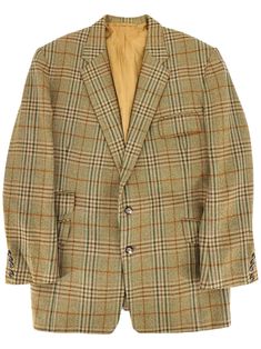 A smart vintage jacket from the 1960s realised in a natural-coloured high-quality suiting cloth with a tan and green check pattern. A two-button single-breasted fastening with four buttons at each cuff. Three flap pockets and a breast pocket make four front pockets in total. Fully lined.  Made in Scotland. Measurements: Chest: 40 inch / 102 cm Length: 30 inch / 76 cm  Shoulders: 19.5 inch / 50 cm Sleeve: 24 inch / 61 cm Vintage Style Shoes, Vintage Umbrella, Vintage Knitwear, Vintage Gloves, Vintage Tank Top, Vintage Trousers, Vintage Tank, Vintage Suits, Vintage Style Dresses