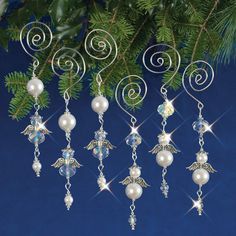 christmas ornaments hanging from a tree branch