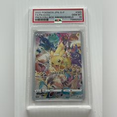 the pokemon card is in its plastic package