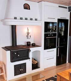 the kitchen is clean and ready to be used as a living room or dining area