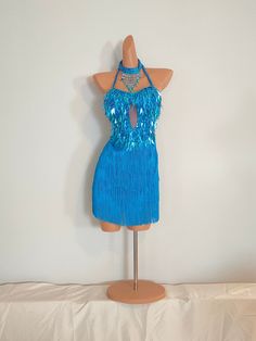 SAMBA FACTORY Lovely handmade Sequin / Beads Dress with beads choker. Open back, tied at the back. ( See pictures ) Perfect as a Samba or Dance competition Dress or for Clubbing an a night out ! This listing is for : TURQUOISE Fringe / Beads Dress, open back. Incl. beads Choker !  ( Please see all pictures ! ) We have many more colors of this gorgeous dresses in stock, please browse in our store ! Dress size : Fits perfect for AU/UK Size 8-10 !  Equivalent to US Size 4-6 ! If you need larger siz Fitted Sequin Dress For Carnival, Fitted Mini Dress For Carnival, Blue Fitted Dress For Festival, Blue Fitted Dress For Fiesta, Fitted Blue Dress For Fiesta, Fitted Blue Fiesta Dresses, Sleeveless Sequin Dance Dress, Sleeveless Sequin Dress For Dance, Carnival Show