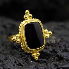 Ancient Black Onyx Ring | 24K Gold Plated | Tree Bark  Silver  Ring | 925 Sterling Silver | Christmas Gifts | Vintage Ring Gift  Our shop offer free ring sizing Handcrafted Tree Bark Ring  Metal : 925 Sterling Silver Plating : 24K Gold Band Width : 4 mm Gem Stone : Onyx Gem Color : Black Gem Size : 18 X 14 mm Ring Size : 30X 25 mm Ring Weight : 9.3 grams Ring Size : US 6 (The size you want is made for free). (We used the US standard sizing)  **Custom Orders is Made** As pellada family, we will be happy to help you if you contact us with the photo and dimensions of the design you want. To return back to Pellada Shop Home Page,Click here! https://www.etsy.com/shop/Pellada Thank you for shopping! Pellada Black 22k Gold Jewelry As A Gift, Black 22k Gold Jewelry Gift, Bark Ring, Black Gems, Gold Armband, Black Onyx Ring, Ancient Jewelry, Silver Christmas, Tree Bark