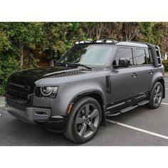 an suv is parked in a parking lot