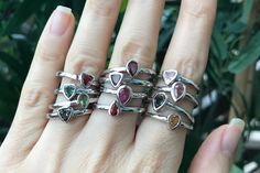 "A collection of dainty stackable tourmaline sterling silver ring in a variety of colors and shapes is sure to impress your boho friends. These are one-of-a-kind rings which we have chosen each stone and set it in a simple bezel setting with a low profile. Wrapped in a box ready for gift-giving.(r-nc-92) Choose your favorite Tourmaline Ring from the last photo We offer sizing services for a nominal fee contact us for pricing ---> Don't know your ring size? Purchase our ring sizing gauge https Stackable Tourmaline Jewelry As Gift, Stackable Tourmaline Jewelry Gift, Silver Tourmaline Birthstone Ring With Gemstone, Stackable Tourmaline Jewelry For Anniversary, Silver Tourmaline Ring With Gemstone Accents, Stackable Tourmaline Rings Fine Jewelry, Stackable Tourmaline Rings In Fine Jewelry Style, Pink Watermelon, Dainty Rings