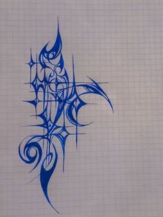 a blue tattoo design on a sheet of paper