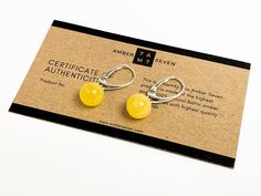 Stylish and unique handmade amber sphere earrings. Made of 100% natural organic Baltic Amber. As amber is an all-natural gemstone, every earring is unique that's why every piece of jewelry is one of the kind. Earrings already come in gift-ready packaging made of only eco recycled materials. AMBER COLOR Cognac / Butterscotch AMBER FINISH Polished MATERIAL Baltic amber, 925 sterling silver LENGHT ~ 3 cm / 1.2 inch STONE LENGHT ~ 1 cm / 0.4 inch WIDTH ~ 1 cm / 0.4 inch Yellow Minimalist Round Earrings, Modern Amber Earrings As A Gift, Modern Amber Earrings For Gift, Minimalist Amber Earrings For Gift, Baltic Amber Necklace, Amber Bracelet, Teething Necklace, Amber Necklace, Sterling Silver Drop Earrings