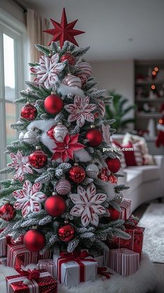 a christmas tree decorated with red and white ornaments