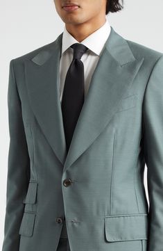 Tom Ford's contemporary elegance shines through in the masterful tailoring of this yarn-dyed wool-silk suit that pairs a cutaway jacket with flat front pants. Jacket has peaked lapels; five-button cuffs; chest welt pocket; front flap pockets; ticket pocket Pants have zip fly with hook-and-bar closure; adjustable waist tabs; front slant pockets; back button-welt pockets Jacket is lined 92% wool, 8% silk Dry clean Made in Italy Designer Clothing Mohair Suit, Suits Harvey, Cashmere Suit, Silk Pajama Pants, Tom Ford Suit, Mens Pajama Pants, Mens Suit Jacket, Men's Toms, Green Suit