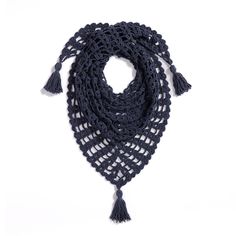 a crocheted scarf with tassels hanging from the side on a white background