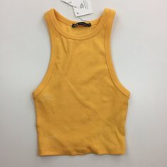 Brand New. Have White'ish Marks On Shirt. Pls Read About Sizing. Labeled As Size Small. Small Would Be Very Fitted. Could Also Fit An Xs Well. Higher Neckline. Cropped. Ribbed Cotton Stretch Fabric. Have Faint White'ish Marks In Front, Lower Part Of Body. Pls See Last Pictures. New W Tag. Measurements ( Approx. ) One Side, While Item Is Laying Flat On Surface - Not Stretched. Bust (Armpit To Armpit): 9.5-10" Length: 13.5" From Top Of Back. From Smoke/Pet Free Environment. Pma59c. Casual Fitted Cami Vest, Sleeveless Ribbed Stretch Tops, Casual Stretch Halter Neck Vest, Trendy Solid Cami Vest, Ribbed Sleeveless Stretch Crop Top, Sleeveless Ribbed Stretch Crop Top, Stretch Ribbed Sleeveless Crop Top, Summer Solid Vest Crop Top, Trendy Black Sleeveless Crop Top