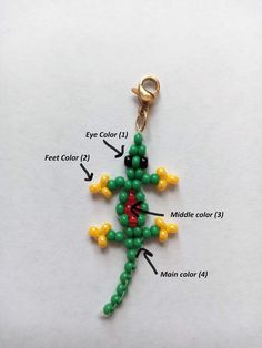 an image of a key chain with beads attached to it and labeled on the side