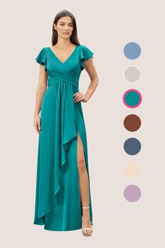 a woman in a long green dress standing next to color swatches and wearing sandals