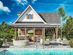 a house with a pool in front of it and an outdoor kitchen on the back