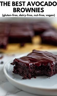 a piece of chocolate cake sitting on top of a white plate