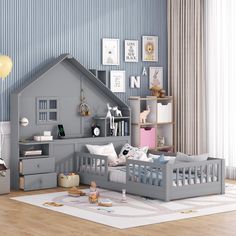 a child's room with a bed, dresser and toy house