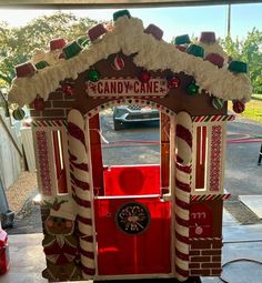 a candy cane machine is decorated to look like it has been built into the ground